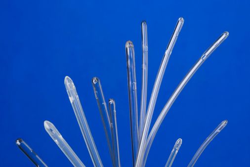 intermittent catheters with blue background