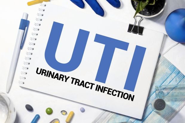 notepad with the word UTI Urinary Tract Infection on it